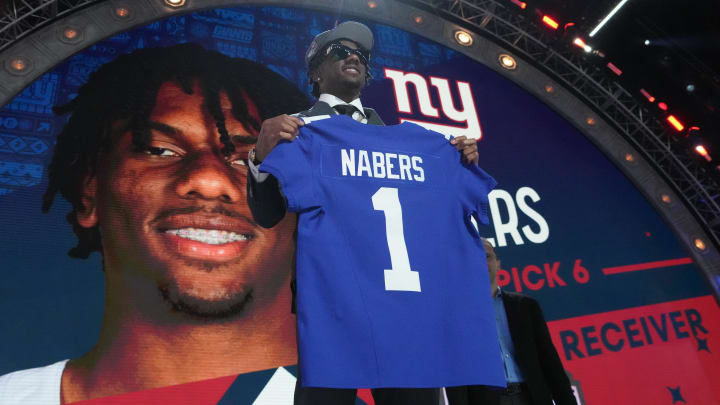 Apr 25, 2024; Detroit, MI, USA; LSU Tigers wide receiver Malik Nabers poses after being selected by the New York Giants as the No. 6 pick in the first round of the 2024 NFL Draft at Campus Martius Park and Hart Plaza. Apr 25, 2024; Detroit, MI, USA; LSU Tigers wide receiver Malik Nabers poses after being selected by the New York Giants as the No. 6 pick in the first round of the 2024 NFL Draft at Campus Martius Park and Hart Plaza.
