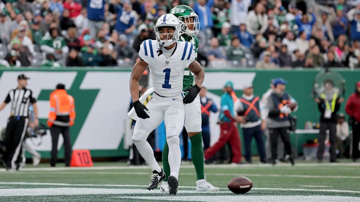 Nov 17, 2024; East Rutherford, New Jersey, USA; Indianapolis Colts wide receiver Josh Downs (1) celebrates his touchdown against the New York Jets during the fourth quarter at MetLife Stadium. Mandatory Credit: Brad Penner-Imagn Images