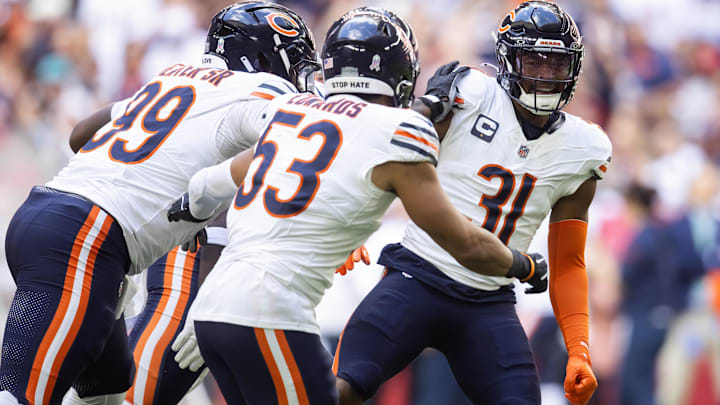 Chicago Bears safety Kevin Byard III (31) celebrates a play with teammates against the Arizona Cardinals in the first half at State Farm Stadium.