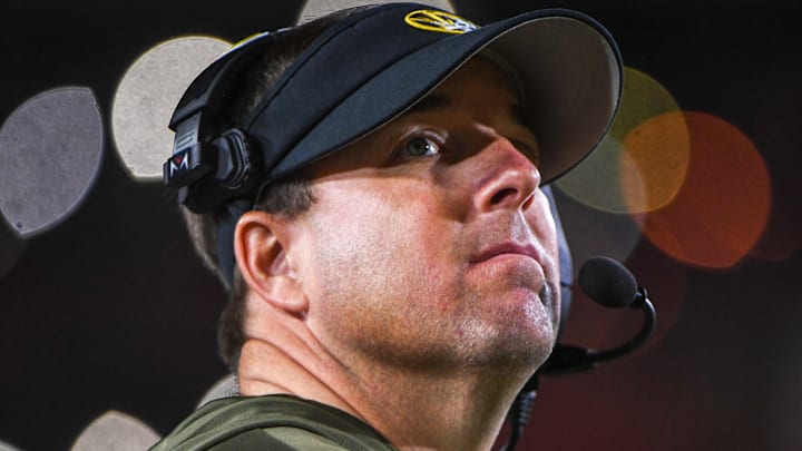 Nov 15, 2025; Columbia, Missouri, USA; Missouri Tigers head coach Eli Drinkwitz looks at the scoreboard in the Missouri matchup against Mississippi State at Faurot Field.
