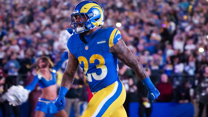 Jan 13, 2025; Glendale, AZ, USA; Los Angeles Rams running back Kyren Williams (23) against the Minnesota Vikings during an NFC wild card game at State Farm Stadium. Mandatory Credit: Mark J. Rebilas-Imagn Images