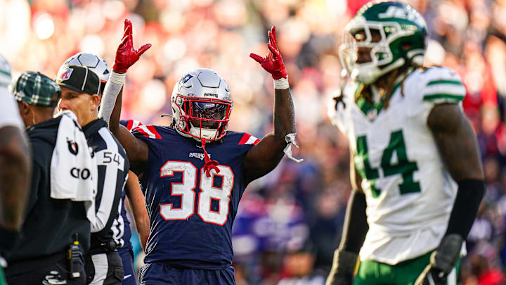 Oct 27, 2024; Foxborough, Massachusetts, USA; New England Patriots running back Rhamondre Stevenson (38) reacts after his touchdown is confirmed against the New York Jets in the second half at Gillette Stadium. Mandatory Credit: David Butler II-Imagn Images Oct 27, 2024; Foxborough, Massachusetts, USA; New England Patriots running back Rhamondre Stevenson (38) reacts after his touchdown is confirmed against the New York Jets in the second half at Gillette Stadium. Mandatory Credit: David Butler II-Imagn Images