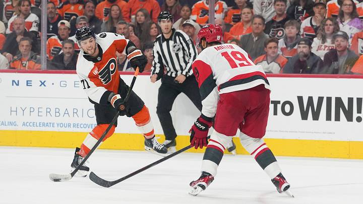 May 9, 2026; Philadelphia, Pennsylvania, USA; Philadelphia Flyers right wing Tyson Foerster (71) shoots the puck, defended by Carolina Hurricanes defenseman K'Andre Miller (19) during the third period in game four of the second round of the 2026 Stanley Cup Playoffs at Xfinity Mobile Arena. Mandatory Credit: James Lang-Imagn Images