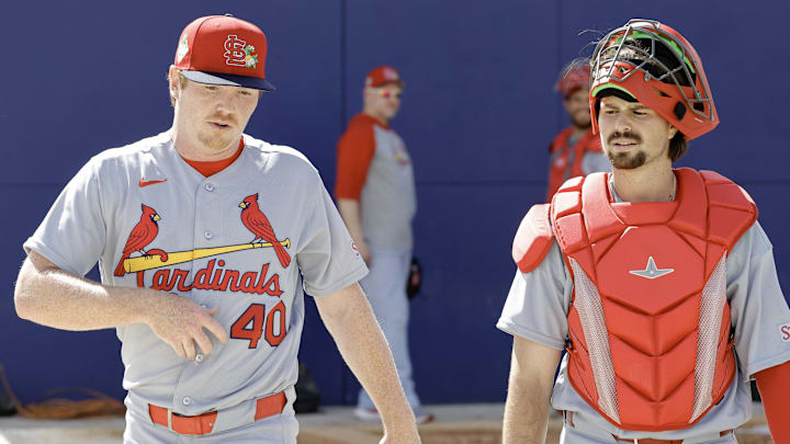 Feb 16, 2026; Jupiter, FL, USA; St. Louis Cardinals catcher prospect Grayson Tarlow (right) walks with pitcher Hunter Dobbins (40) during spring training workouts at Roger Dean Stadium. Mandatory Credit: Reinhold Matay-Imagn Images Feb 16, 2026; Jupiter, FL, USA; St. Louis Cardinals catcher prospect Grayson Tarlow (right) walks with pitcher Hunter Dobbins (40) during spring training workouts at Roger Dean Stadium. Mandatory Credit: Reinhold Matay-Imagn Images