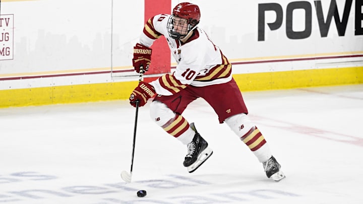 Feb 28, 2025; Chestnut Hill, MA, USA; Boston College forward James Hagens (10) skates with the puck during the second period against the University of New Hampshire Wildcats at Conte Forum. Mandatory Credit: Eric Canha-Imagn Images