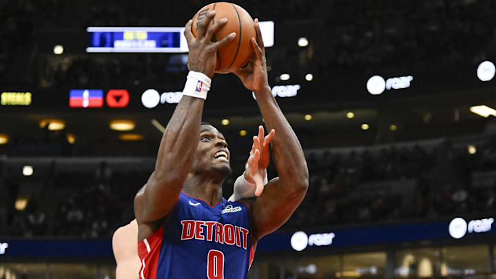 Feb 12, 2025; Chicago, Illinois, USA;  Detroit Pistons center Jalen Duren (0) shoots against Chicago Bulls center Nikola Vucevic (9) during the second half at the United Center. Mandatory Credit: Matt Marton-Imagn Images