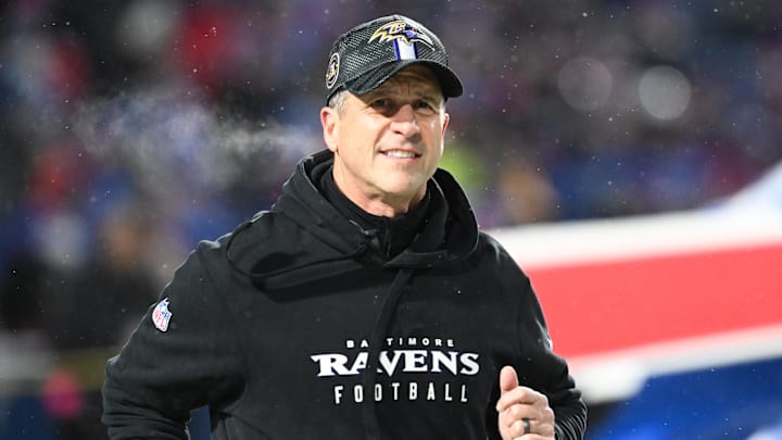 Jan 19, 2025; Orchard Park, New York, USA; Baltimore Ravens head coach John Harbaugh takes the field before the game against the Buffalo Bills in a 2025 AFC divisional round game at Highmark Stadium. Mandatory Credit: Mark Konezny-Imagn Images
