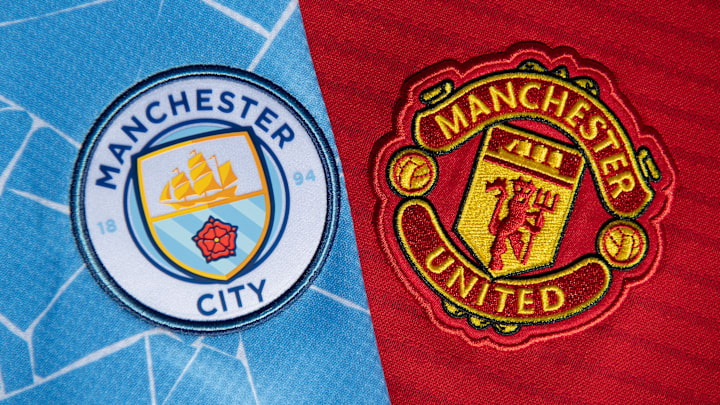 The Manchester City and Manchester United Badges