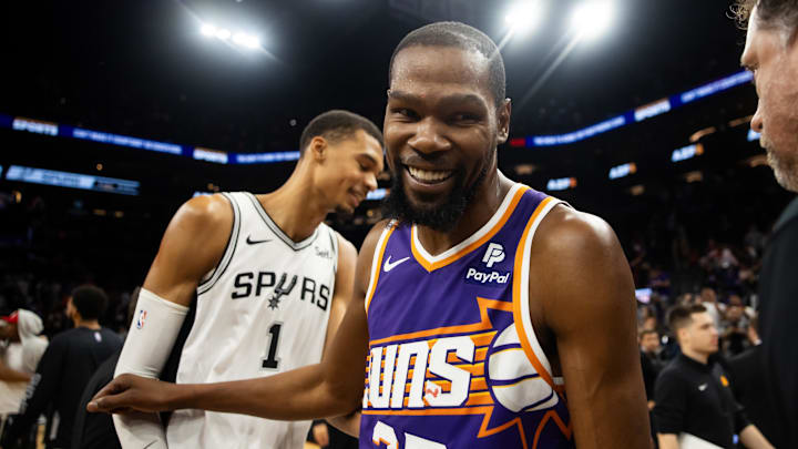 Nov 2, 2023; Phoenix, Arizona, USA; Phoenix Suns forward Kevin Durant (35) greets San Antonio Spurs center Victor Wembanyama (1)  following the game at Footprint Center. Mandatory Credit: Mark J. Rebilas-Imagn Images