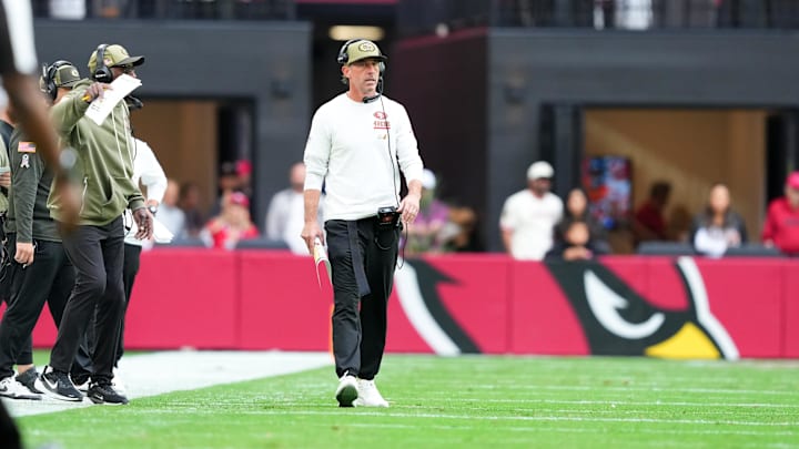 Nov 16, 2025; Glendale, Arizona, USA; San Francisco 49ers head coach Kyle Shanahan looks on during the first half against the Arizona Cardinals at State Farm Stadium. Mandatory Credit: Joe Camporeale-Imagn Images