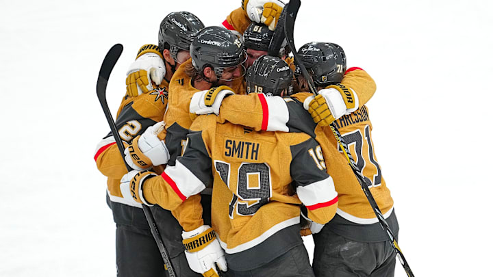Apr 12, 2025; Las Vegas, Nevada, USA; Vegas Golden Knights defenseman Noah Hanifin (15) celebrates with team mates after scoring a goal against the Nashville Predators during the third period at T-Mobile Arena. Mandatory Credit: Stephen R. Sylvanie-Imagn Images