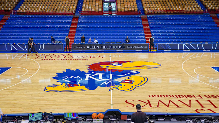 Dec 31, 2022; Lawrence, Kansas, USA; A general view of the center court logo prior to a game between the Kansas Jayhawks and Oklahoma State Cowboys at Allen Fieldhouse. Mandatory Credit: Denny Medley-Imagn Images Dec 31, 2022; Lawrence, Kansas, USA; A general view of the center court logo prior to a game between the Kansas Jayhawks and Oklahoma State Cowboys at Allen Fieldhouse. Mandatory Credit: Denny Medley-Imagn Images