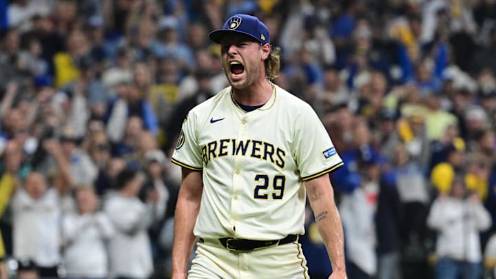 Oct 13, 2025; Milwaukee, Wisconsin, USA; Milwaukee Brewers relief pitcher Trevor Megill (29) reacts after a strikeout to end the eighth inning against the Los Angeles Dodgers during game one of the NLCS round for the 2025 MLB playoffs at American Family Field. Mandatory Credit: Benny Sieu-Imagn Images Oct 13, 2025; Milwaukee, Wisconsin, USA; Milwaukee Brewers relief pitcher Trevor Megill (29) reacts after a strikeout to end the eighth inning against the Los Angeles Dodgers during game one of the NLCS round for the 2025 MLB playoffs at American Family Field. Mandatory Credit: Benny Sieu-Imagn Images