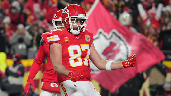 Jan 18, 2025; Kansas City, Missouri, USA; Kansas City Chiefs tight end Travis Kelce (87) reacts after catching a pass for a touchdown against the Houston Texans during the fourth quarter of a 2025 AFC divisional round game at GEHA Field at Arrowhead Stadium. Mandatory Credit: Denny Medley-Imagn Images