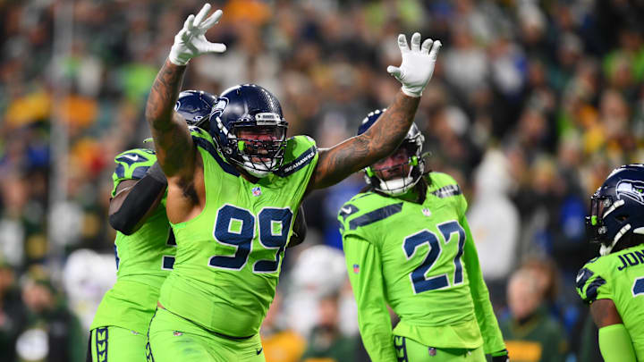 Seattle Seahawks defensive lineman Leonard Williams  celebrates after a play against the Green Bay Packers.