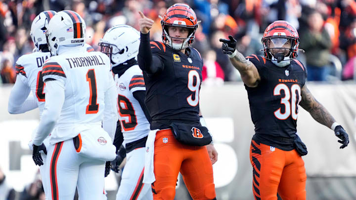 Cincinnati Bengals quarterback Joe Burrow (9) and running back Chase Brown (30) celebrate after a first down run by Burrow in the second quarter of the NFL Week 16 game between the Cincinnati Bengals and the Cleveland Browns at Paycor Stadium in downtown Cincinnati on Sunday, Dec. 22, 2024. 