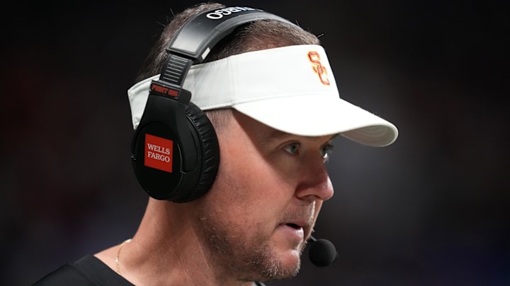 Dec 30, 2025; San Antonio, TX, USA; Southern California Trojans head coach Lincoln Riley watches in the first half against the TCU Horned Frogs during the Alamo Bowl at Alamodome. Mandatory Credit: Kirby Lee-Imagn Images