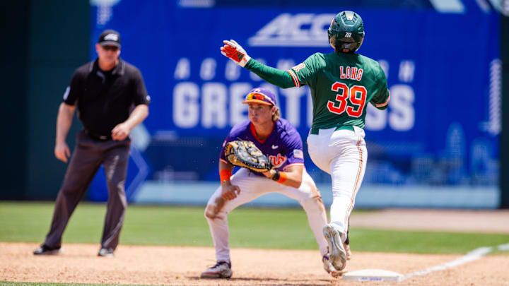 Miami (Fl) Hurricanes outfielder Jacoby Long (39) runs to first in the eighth inning against the Clemson Tigers during the ACC Baseball Tournament at Truist Field. 