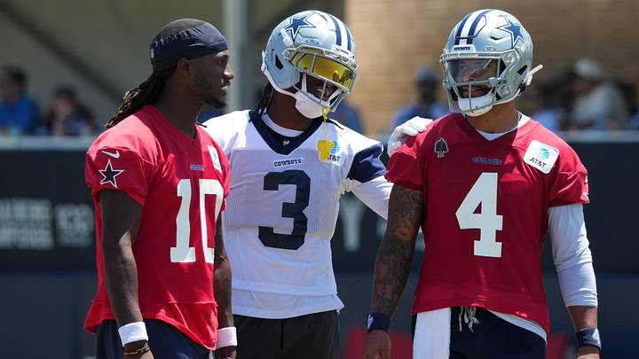 Dallas Cowboys quarterback Joe Milton III, receiver George Pickens, and quarterback Dak Prescott at training camp. Dallas Cowboys quarterback Joe Milton III, receiver George Pickens, and quarterback Dak Prescott at training camp.