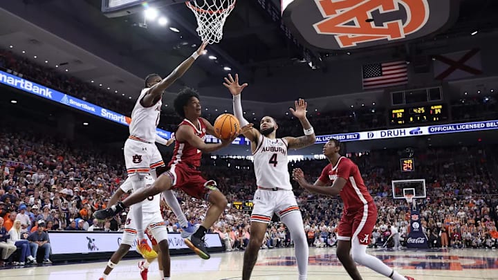 Alabama guard Aden Holloway (2) shoots a layup against Auburn at Neville Arena in Auburn, AL on Saturday, Mar 8, 2025.