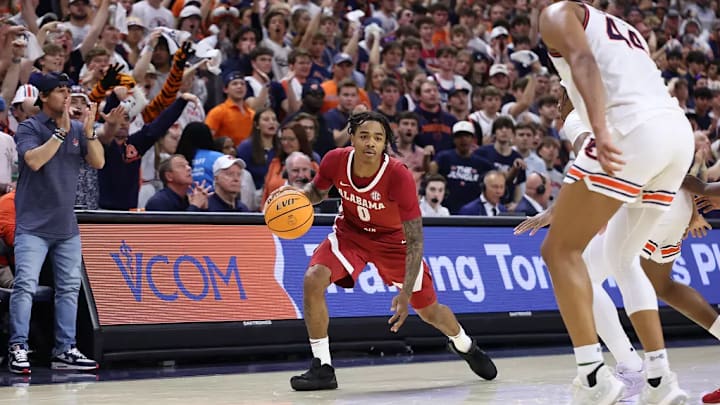 Alabama guard Labaron Philon (0) dribbles the ball against Auburn at Neville Arena in Auburn, AL on Saturday, Mar 8, 2025.