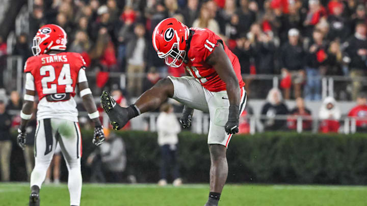 ATHENS, GA - NOVEMBER 16: Georgia Bulldogs linebacker Jalon Walker (11) celebrates a big hit during the college football game between the Tennessee Volunteers and the Georgia Bulldogs on November 16, 2024, on Dooley Field at Sanford Stadium in Athens, GA.
