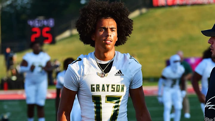 Grayson quarterback Joe Burgess (17) passed for 196 yards and three scores as the Rams advanced to the third round of the Georgia high school football state playoffs.