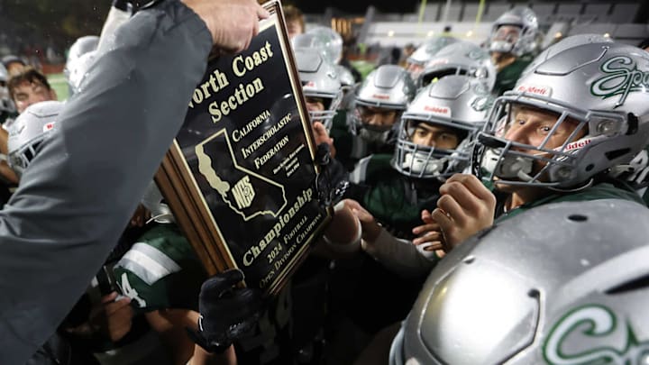 De La Salle enjoying its 32nd straight NCS championship hardware after a 10-7 win over Pittsburg on 11/22/2024 at Diablo Valley College in Pleasant Hill California