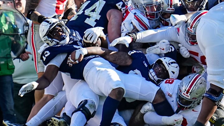 Penn State Nittany Lions running back Kaytron Allen (13) is stopped at the goal line by the Ohio State Buckeyes defense during a Big Ten football game at Beaver Stadium.