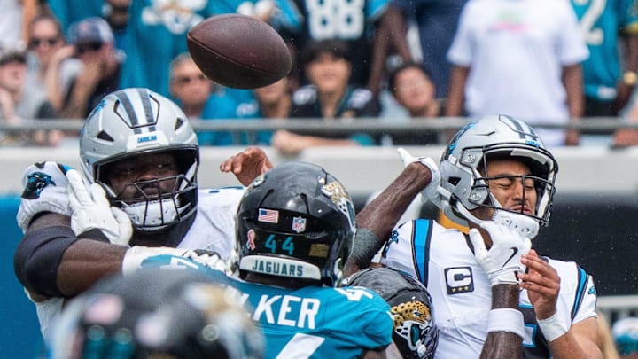Jacksonville Jaguars cornerback Jourdan Lewis (2) breaks up a pass by Carolina Panthers quarterback Bryce Young (9) during the second quarter of an NFL football game between the Carolina Panthers at Jacksonville Jaguars at EverBank Stadium Sunday September 7, 2025. [Doug Engle/Florida Times-Union]