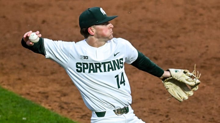 Michigan State's Mitch Jebb fields a ball hit by Michigan during the sixth inning on Friday, April 15, 2022, at Jackson Field in Lansing.

220415 Msu Mich Baseball 121a