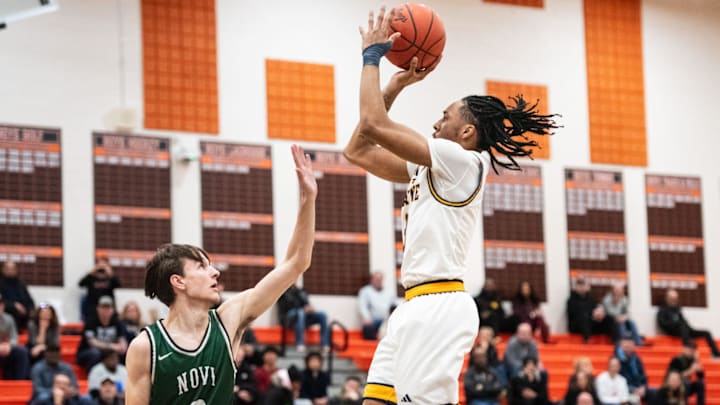 Wayne Memorial's Carlos Medlock Jr. shoots during the Kensington Lakes Activities Association boys basketball championship on Friday, Feb. 21, 2025, at Northville High School.