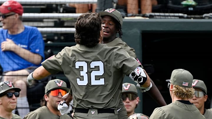 Vanderbilt's Riley Nelson (32) celebrates with R.J. Austin after hitting a two run homer off Georgia pitcher Leighton Finley during the fifth inning of an NCAA college baseball game at Hawkins Field Saturday, April 19, 2025, in Nashville, Tenn. Vanderbilt's Riley Nelson (32) celebrates with R.J. Austin after hitting a two run homer off Georgia pitcher Leighton Finley during the fifth inning of an NCAA college baseball game at Hawkins Field Saturday, April 19, 2025, in Nashville, Tenn.