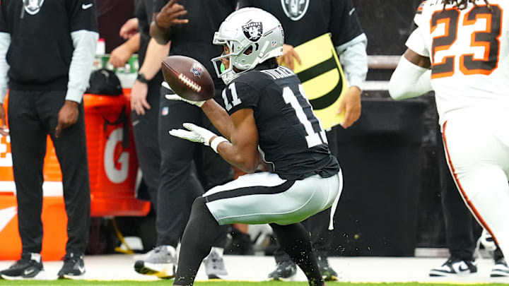 Sep 29, 2024; Paradise, Nevada, USA; Las Vegas Raiders wide receiver Tre Tucker (11) makes a catch against the Cleveland Browns during the second quarter at Allegiant Stadium. Mandatory Credit: Stephen R. Sylvanie-Imagn Images