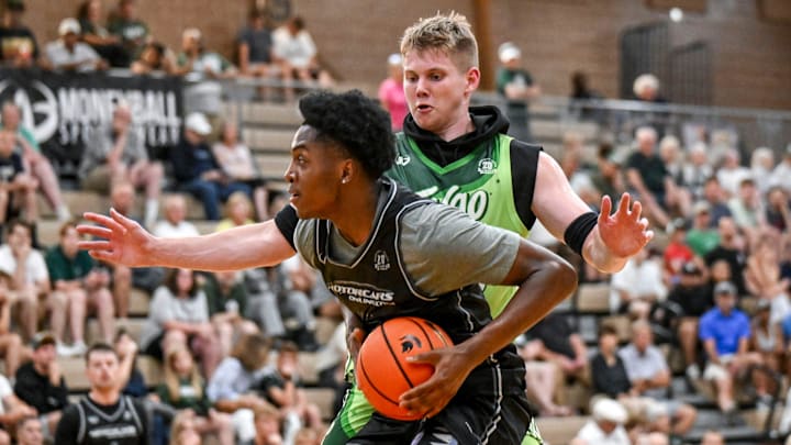 Michigan State's Jaxon Kohler, right, guards Team Motorcars and Michigan State's Cam Ward during the Moneyball Pro-Am on Tuesday, June 24, 2025, at Holt High School.