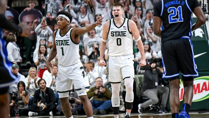 Michigan State's Jaxon Kohler, center, celebrates his 3-pointer against Duke during the first half on Saturday, Dec. 6, 2025, at the Breslin Center in East Lansing. Michigan State's Jaxon Kohler, center, celebrates his 3-pointer against Duke during the first half on Saturday, Dec. 6, 2025, at the Breslin Center in East Lansing.
