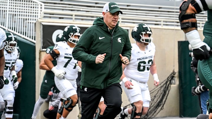 Michigan State's head coach Pat Fitzgerald and the Spartans takes the field during the football Spring Showcase on Saturday, April 18, 2026, at Spartan Stadium in East Lansing.