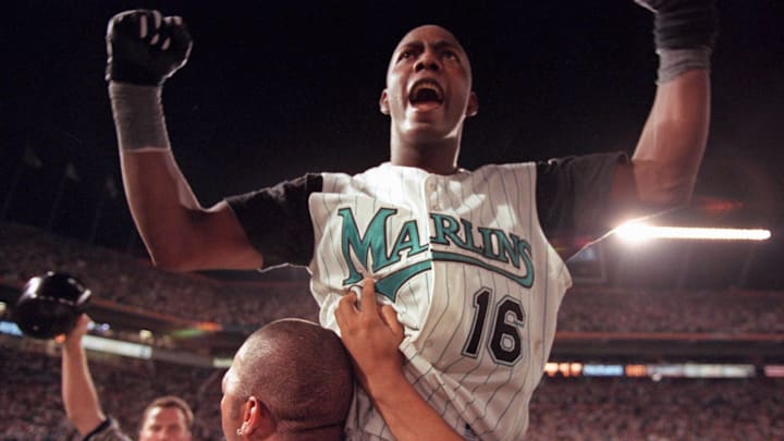 10/27/97 Edgar Renteria is lifted in the air by Gary Sheffield after game winning hit in the 11th inning of the World Series against the Indians. 10/27/97 Edgar Renteria is lifted in the air by Gary Sheffield after game winning hit in the 11th inning of the World Series against the Indians.
