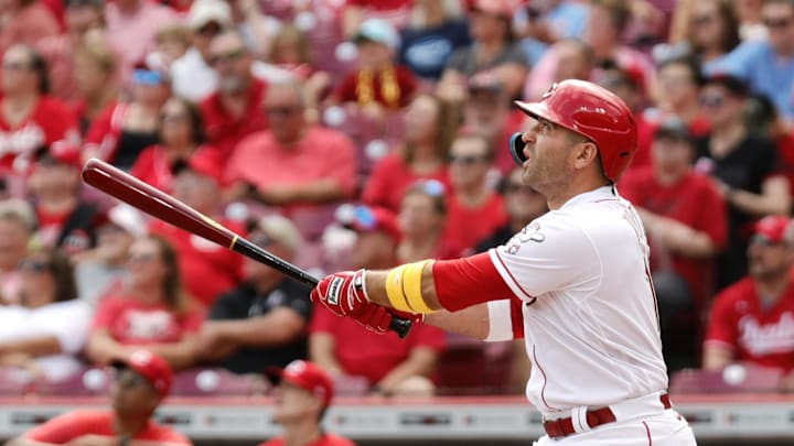 Sep 10, 2023; Cincinnati, Ohio, USA; Cincinnati Reds first baseman Joey Votto (19) hits a solo home run against the St. Louis Cardinals during the eighth inning at Great American Ball Park. Mandatory Credit: David Kohl-Imagn Images