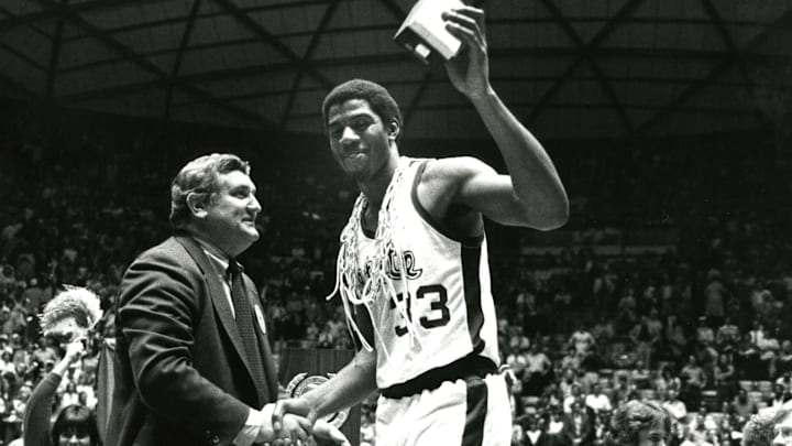 March 26, 1979; Salt Lake City, UT, USA; FILE PHOTO; Michigan State guard Earvin Johnson (33) later know as Magic Johnson during the trophy ceremony at the NCAA Championship game at the 1979 Final Four at the Huntsman Center. Michigan State defeated Indiana State 75-64. Mandatory Credit: Malcolm Emmons-Imagn Images
