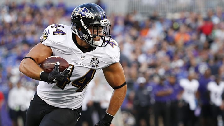 Aug 13, 2015; Baltimore, MD, USA; Baltimore Ravens fullback Kyle Juszczyk (44) carries the ball during the first quarter against the New Orleans Saints in a preseason NFL football game at M&T Bank Stadium. Mandatory Credit: Amber Searls-Imagn Images