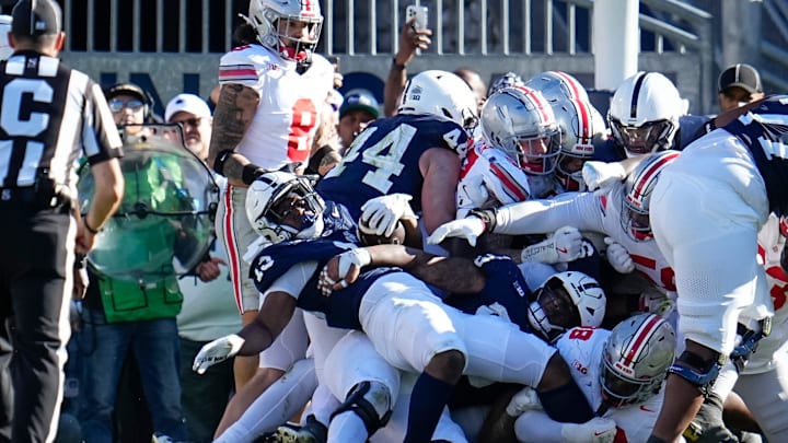 Penn State running back Kaytron Allen (13) is stopped at the goal line by the Ohio State Buckeyes defense during the second half of the NCAA football game at Beaver Stadium. Penn State running back Kaytron Allen (13) is stopped at the goal line by the Ohio State Buckeyes defense during the second half of the NCAA football game at Beaver Stadium.