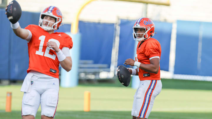Florida quarterback Aaron Philo (12) throws with Florida quarterback Tramell Jones Jr. (9) during spring practice at Sanders Practice Fields in Gainesville, FL on Thursday, March 12, 2026. [Alan Youngblood/Gainesville Sun]