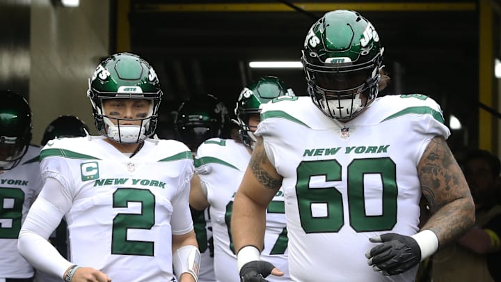 Oct 2, 2022; Pittsburgh, Pennsylvania, USA; New York Jets quarterback Zach Wilson (2) and center Connor McGovern (60) take the field to warm up before the game against the Pittsburgh Steelers at Acrisure Stadium. Oct 2, 2022; Pittsburgh, Pennsylvania, USA; New York Jets quarterback Zach Wilson (2) and center Connor McGovern (60) take the field to warm up before the game against the Pittsburgh Steelers at Acrisure Stadium.