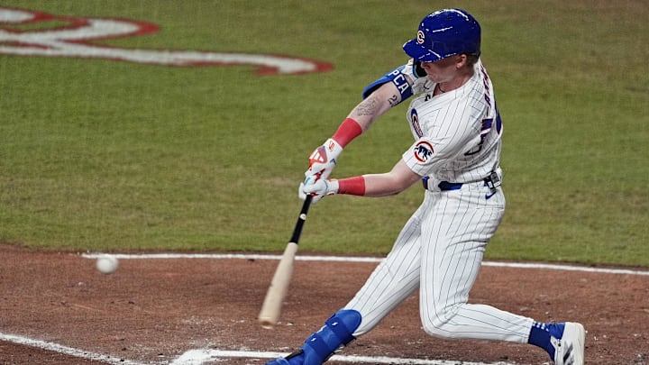 Jul 15, 2025; Cumberland, Georgia, USA; National League outfielder Pete Crow-Armstrong (4) of the Chicago Cubs hits a double during the second inning during the 2025 MLB All Star Game at Truist Park. 