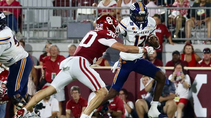 Oklahoma linebacker Dane Bathurst tackles UTEP's Raymond Moore III. Oklahoma linebacker Dane Bathurst tackles UTEP's Raymond Moore III.
