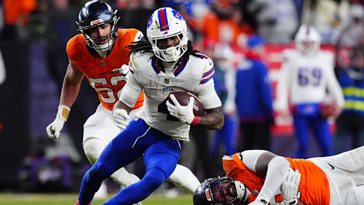 Buffalo Bills RB James Cook III runs against Denver Broncos LB Jonah Elliss and defensive end Eyioma Uwazurike. Buffalo Bills RB James Cook III runs against Denver Broncos LB Jonah Elliss and defensive end Eyioma Uwazurike.