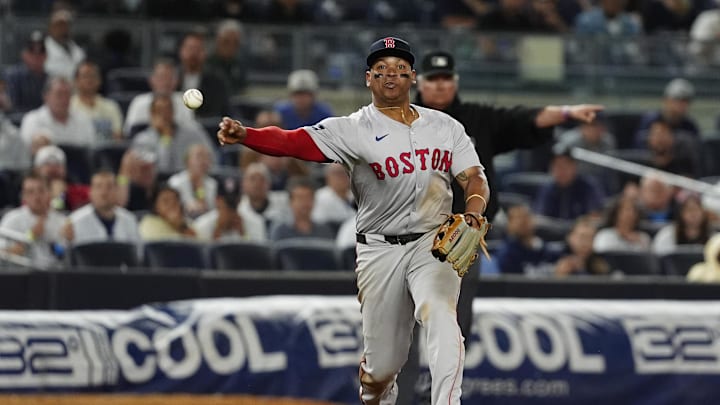 Sep 12, 2024; Bronx, New York, USA; Boston Red Sox third baseman Rafael Devers (11) throws out New York Yankees shortstop Anthony Volpe (not pictured) after fielding a ground ball during the ninth inning at Yankee Stadium. Mandatory Credit: Gregory Fisher-Imagn Images Sep 12, 2024; Bronx, New York, USA; Boston Red Sox third baseman Rafael Devers (11) throws out New York Yankees shortstop Anthony Volpe (not pictured) after fielding a ground ball during the ninth inning at Yankee Stadium. Mandatory Credit: Gregory Fisher-Imagn Images