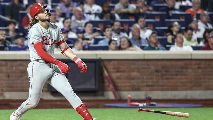 Sep 19, 2024; New York City, New York, USA;  Philadelphia Phillies third baseman Alec Bohm (28) reacts after popping out to end the seventh inning against the New York Mets at Citi Field. 
