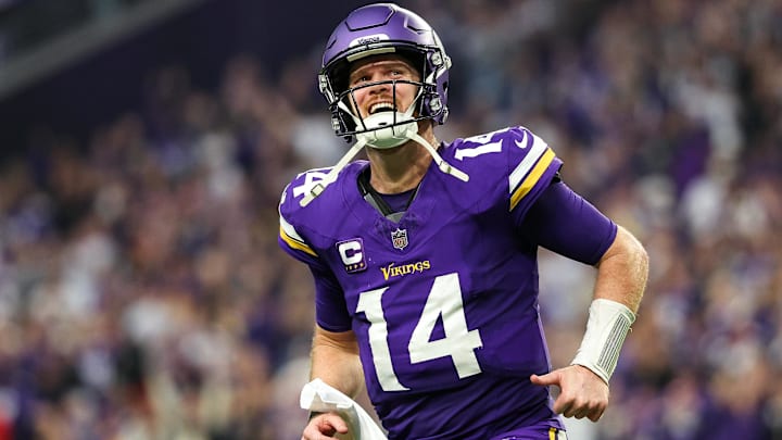 Dec 8, 2024; Minneapolis, Minnesota, USA; Minnesota Vikings quarterback Sam Darnold (14) celebrates running back Aaron Jones' (33) touchdown run against the Atlanta Falcons during the fourth quarter at U.S. Bank Stadium. Dec 8, 2024; Minneapolis, Minnesota, USA; Minnesota Vikings quarterback Sam Darnold (14) celebrates running back Aaron Jones' (33) touchdown run against the Atlanta Falcons during the fourth quarter at U.S. Bank Stadium.
